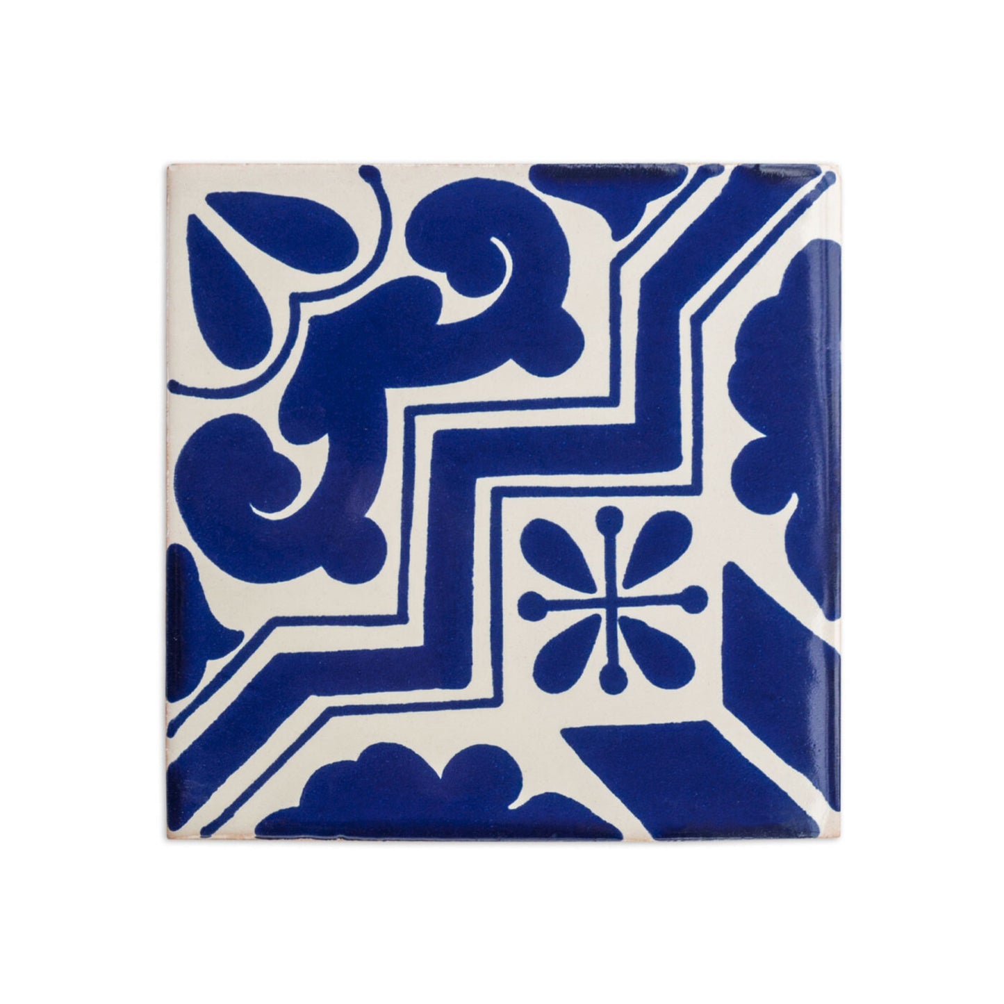 Square white and blue Talavera tile by Clay Imports Handmade Tile, featuring a traditional geometric and floral pattern.
