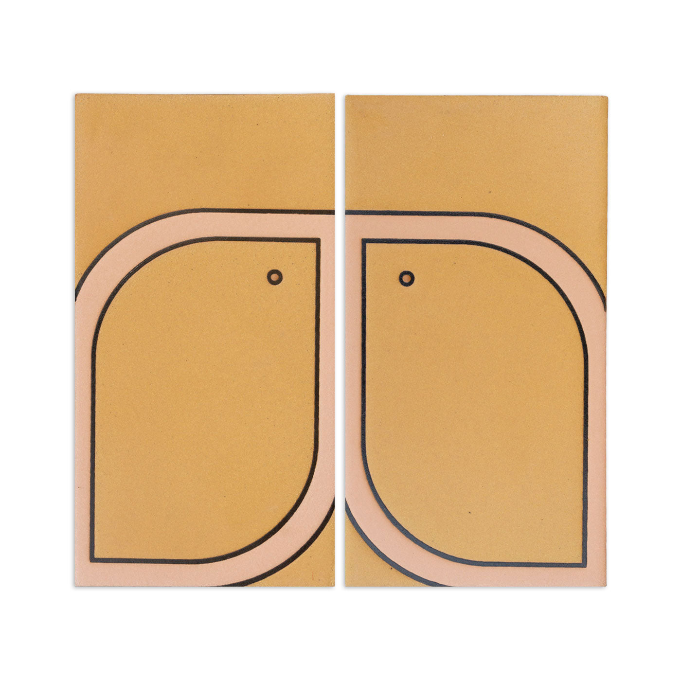 Two tan Pio Pio Petit Plateaus by Clay Imports, with a pink and black abstract bird design on each.