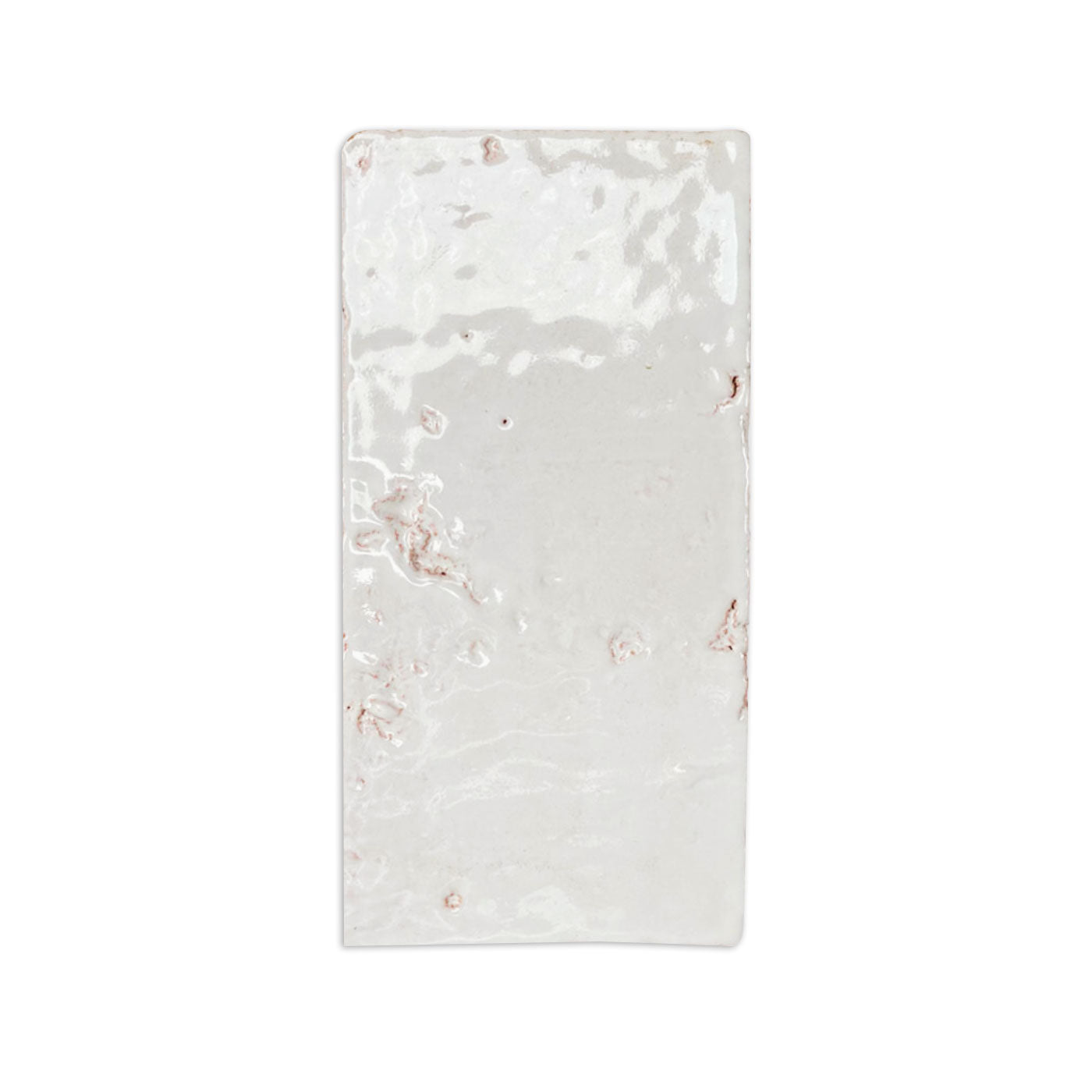 Glazed Antique White Gloss 4x8 tile by Clay Imports, featuring an irregular, glossy surface and rustic reddish accents.