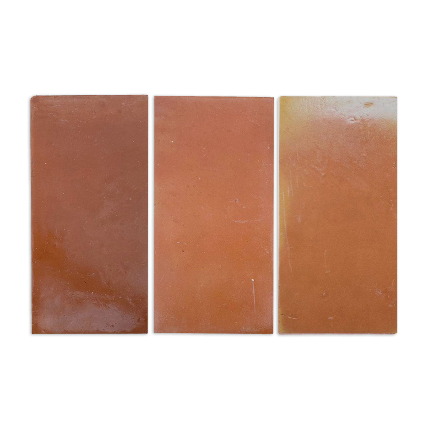 Three smooth satin tile samples by Clay Imports, rectangular with varying reddish-brown colors.