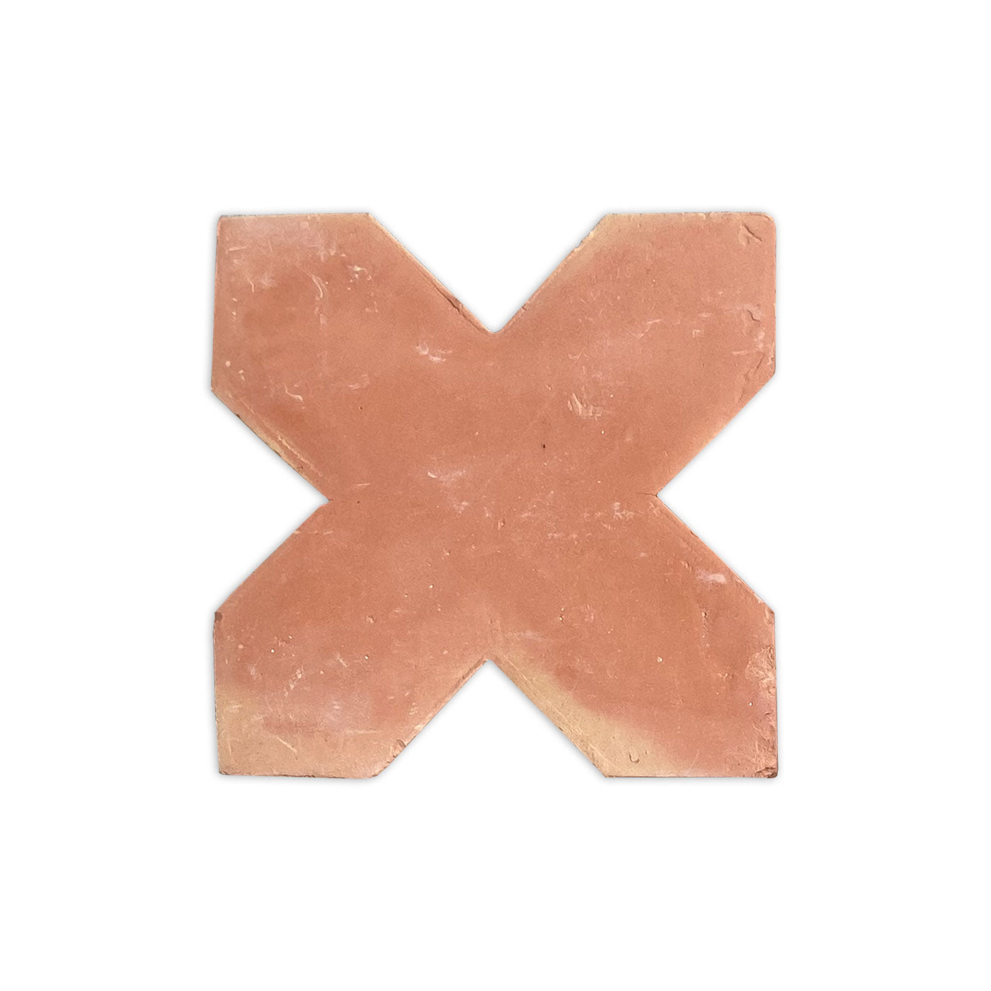 Terracotta cross-shaped tile with a smooth matte finish by Clay Imports, in a reddish-brown color with slightly worn edges.