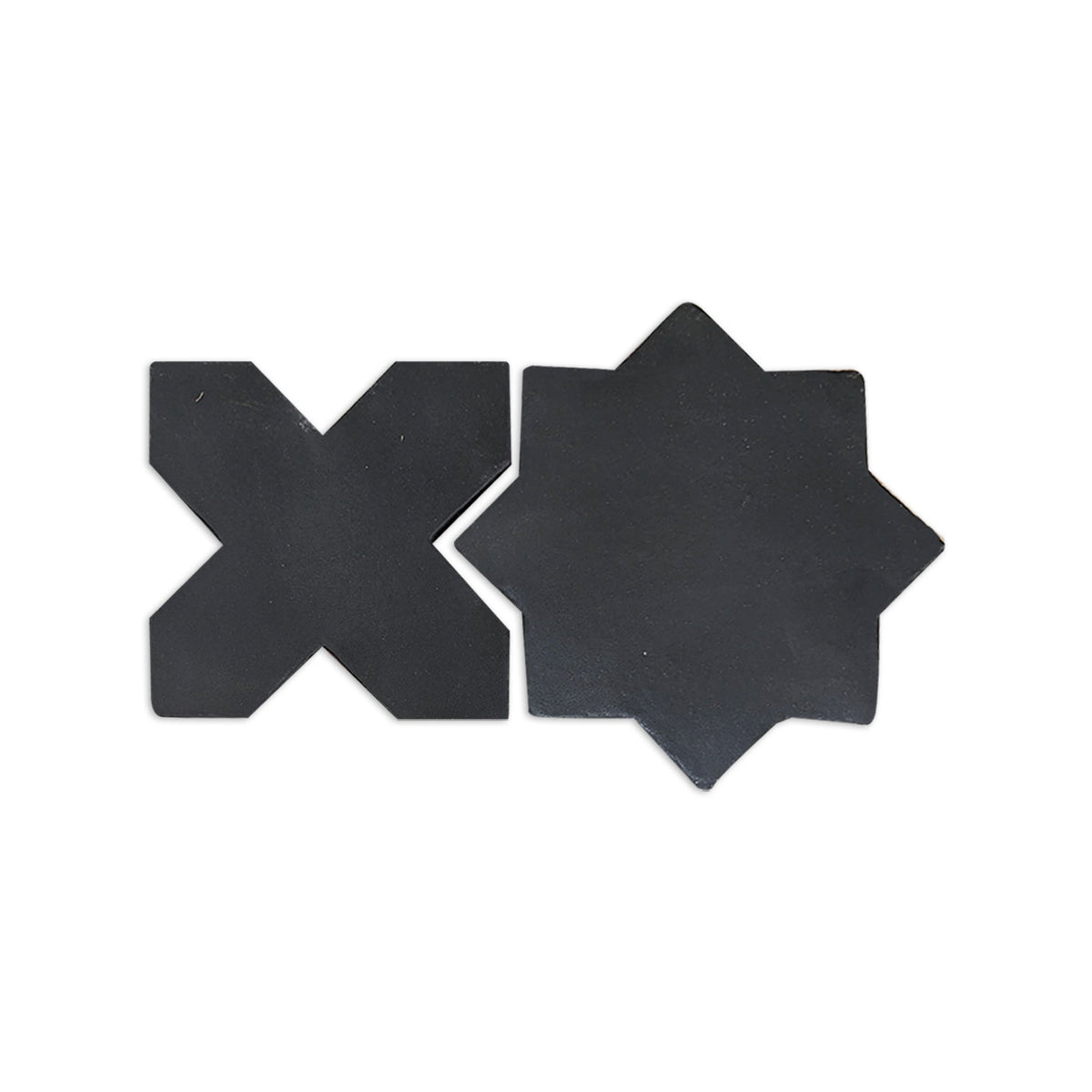 Black suede cross-shaped solid tile by Clay Imports, shown with an eight-point star tile on white.