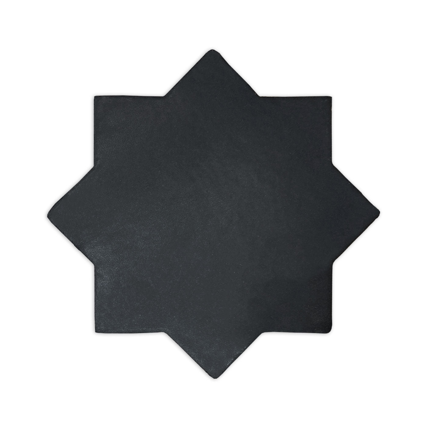 Black suede eight-pointed star sample by Clay Imports with a visible matte texture.