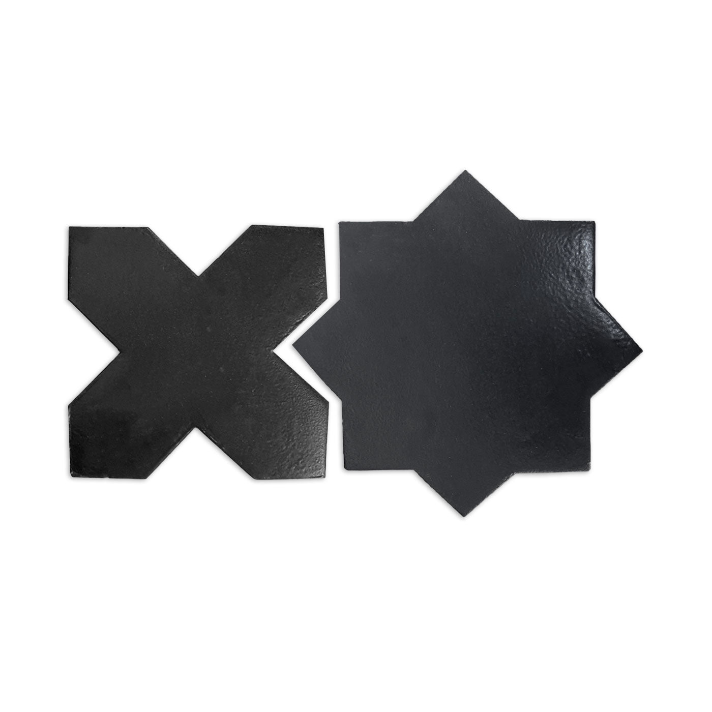 Coal gray glazed terracotta star and cross tiles by Clay Imports with a subtle sheen on a white background.