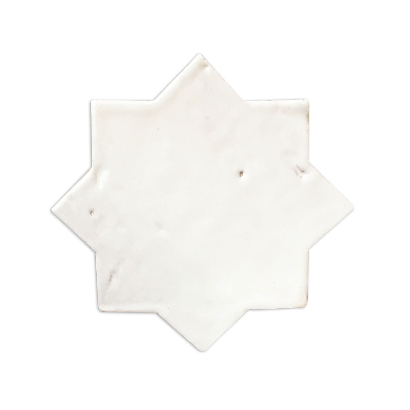 White glazed star tile sample by Clay Imports with a handcrafted texture and subtle natural imperfections.