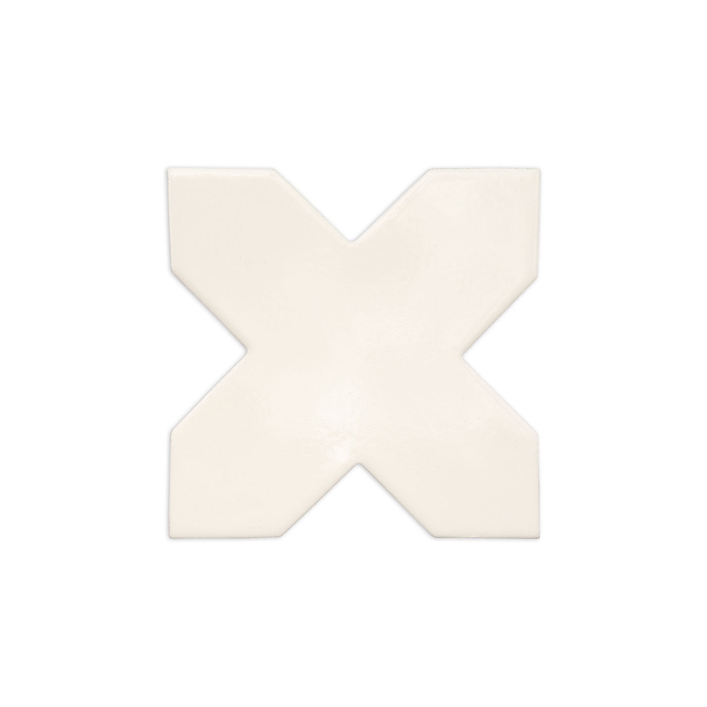 Cream X-shaped tile sample by Clay Imports, with a smooth finish.