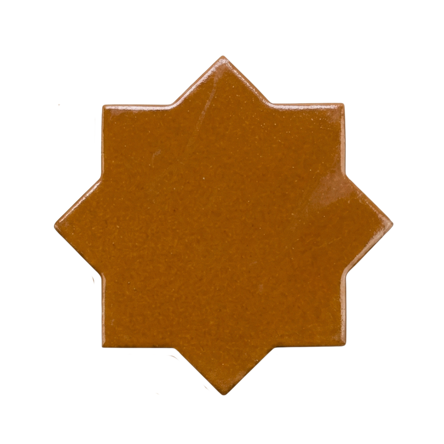 Cajeta-colored eight-pointed star tile by Clay Imports with a speckled, glossy finish.