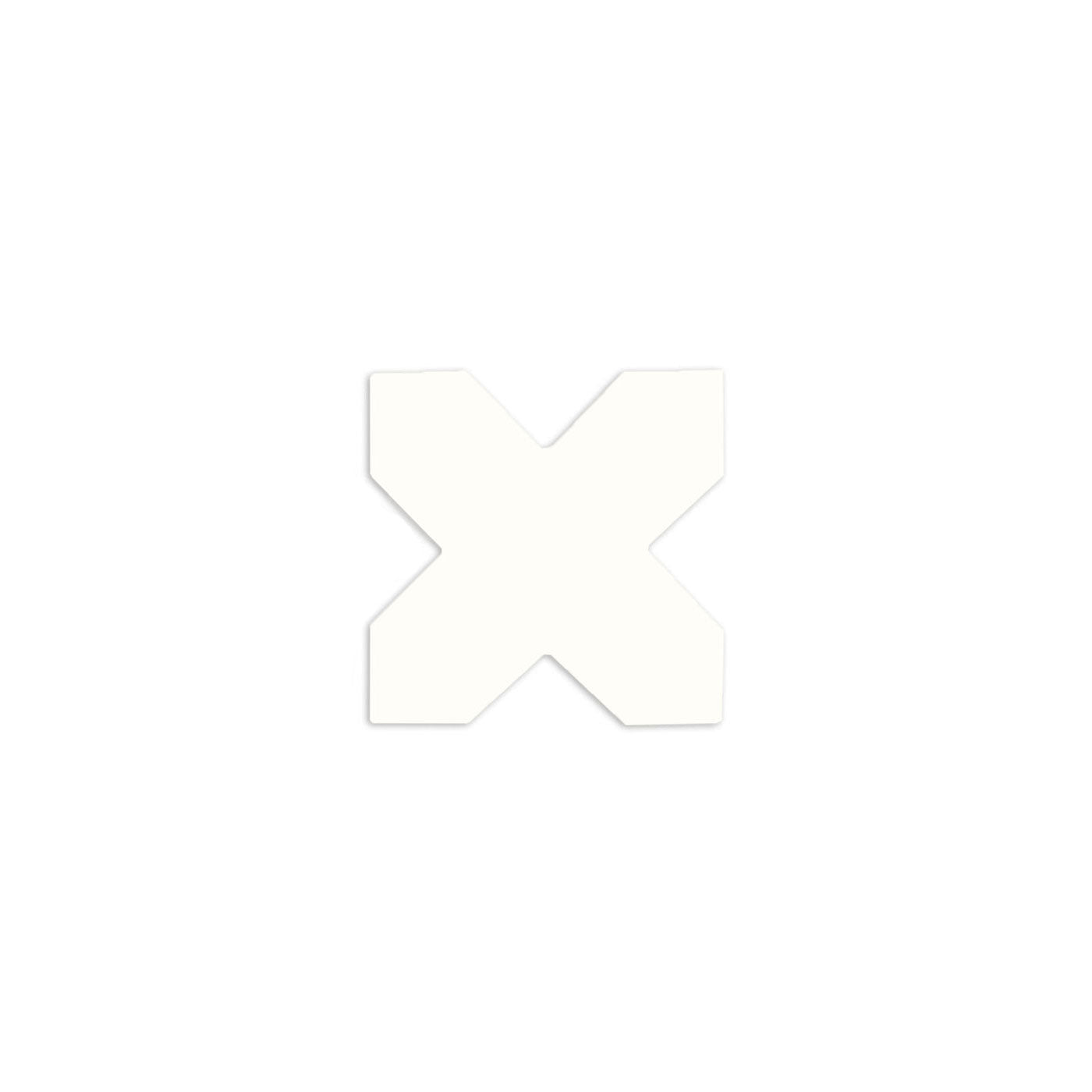Chalk white cross-shaped tile by Clay Imports, isolated with a subtle shadow.