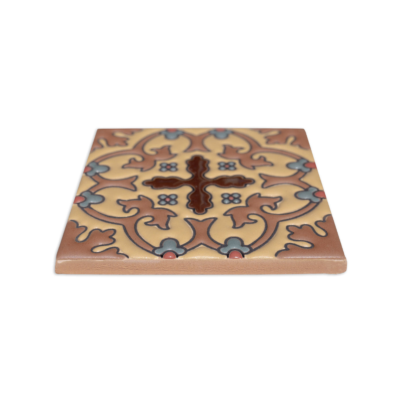 Relief Talavera tile in beige, brown, blue, and red by Clay Imports, with an ornate cross, '88' numbers, and an angled view.