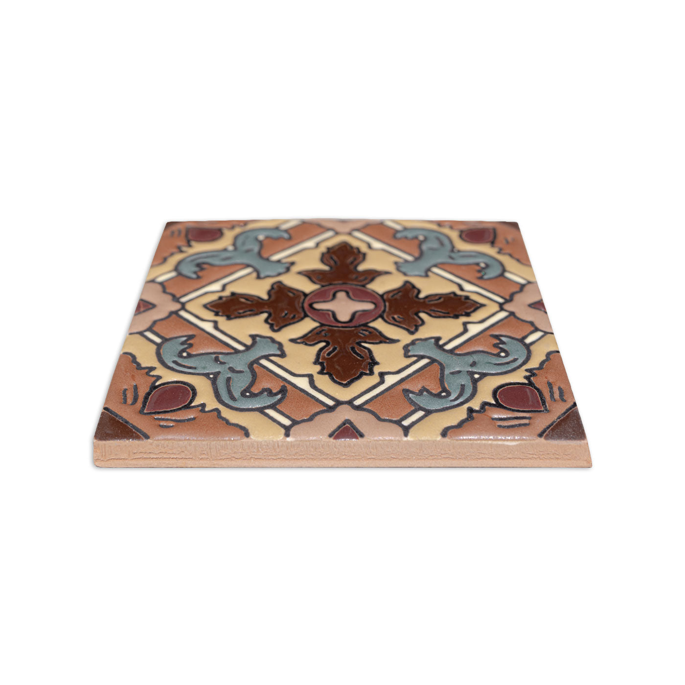 Multicolor Relief Talavera tile by Clay Imports with a geometric and floral pattern in brown, tan, and blue-grey, seen from an elevated angle.