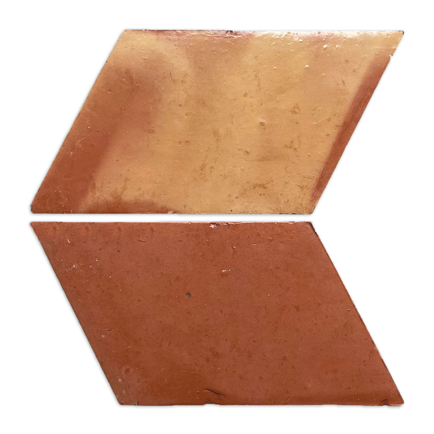 Parallelogram terracotta tiles by Clay Imports with a smooth gloss finish, one light sandy and one dark reddish-brown.