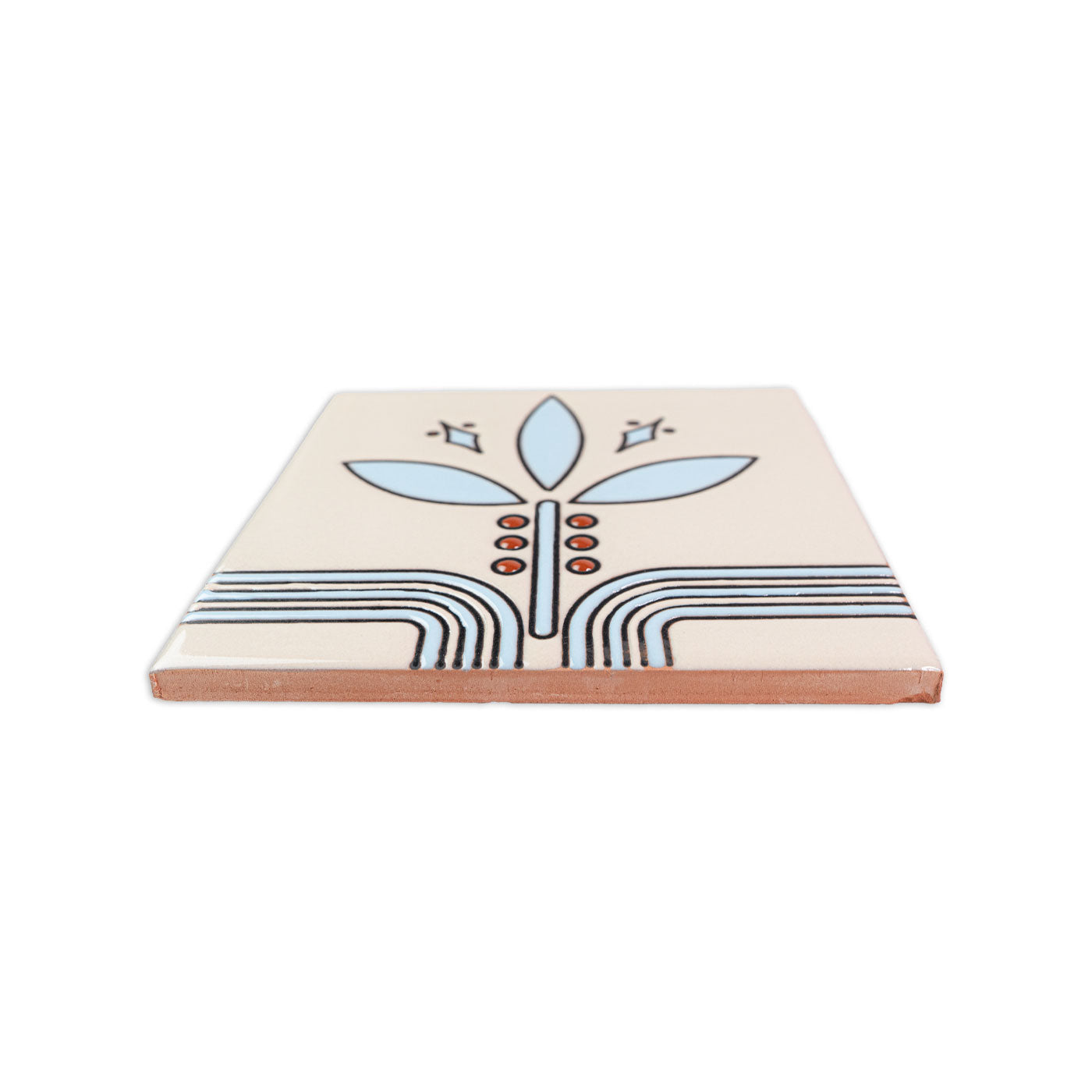 Cream 6x6 pattern tile by Clay Imports, displaying a light blue and red stylized plant design, viewed at an angle.
