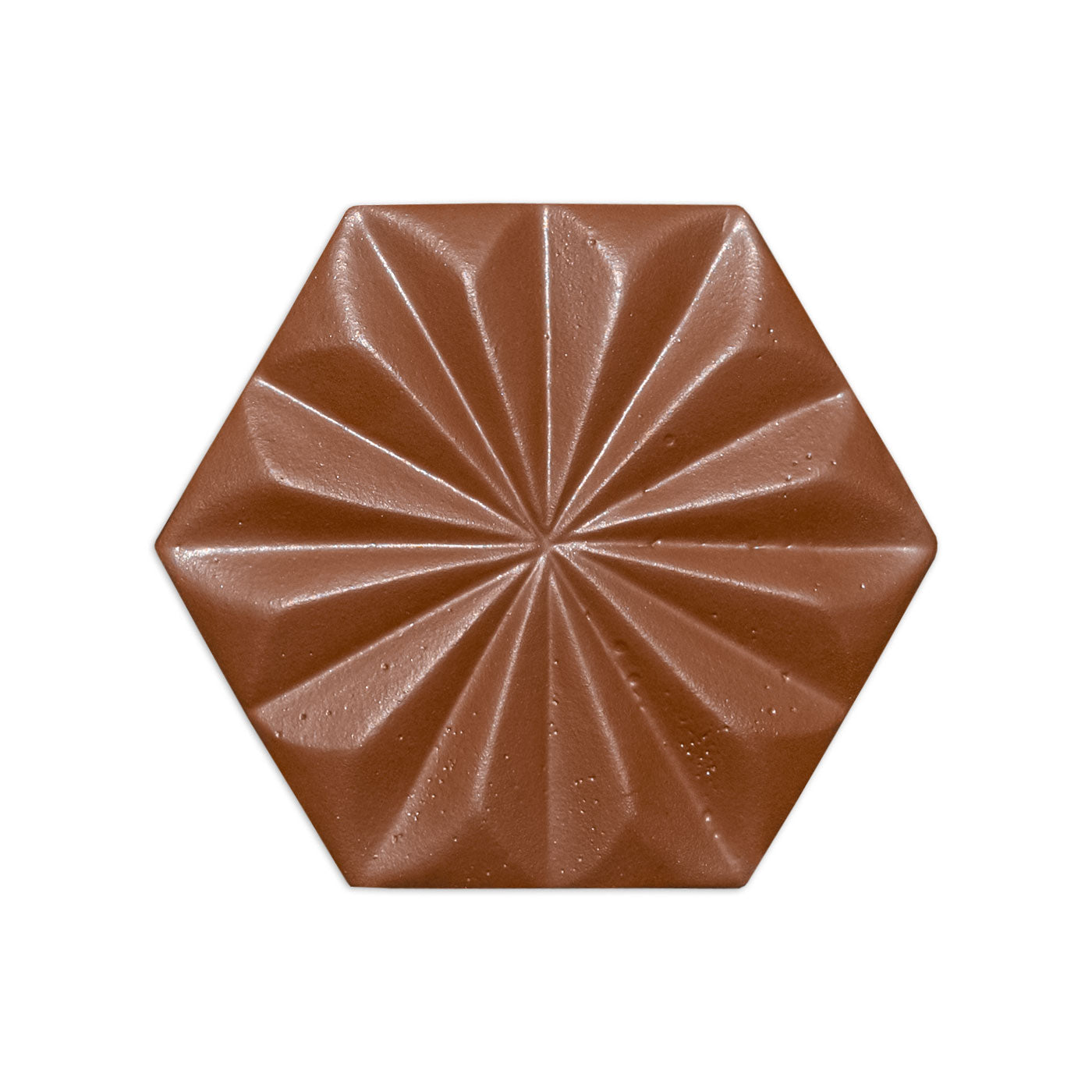Cacao 3 hexagonal tile from Clay Imports, with a geometric starburst pattern and subtle textured finish, isolated on white.