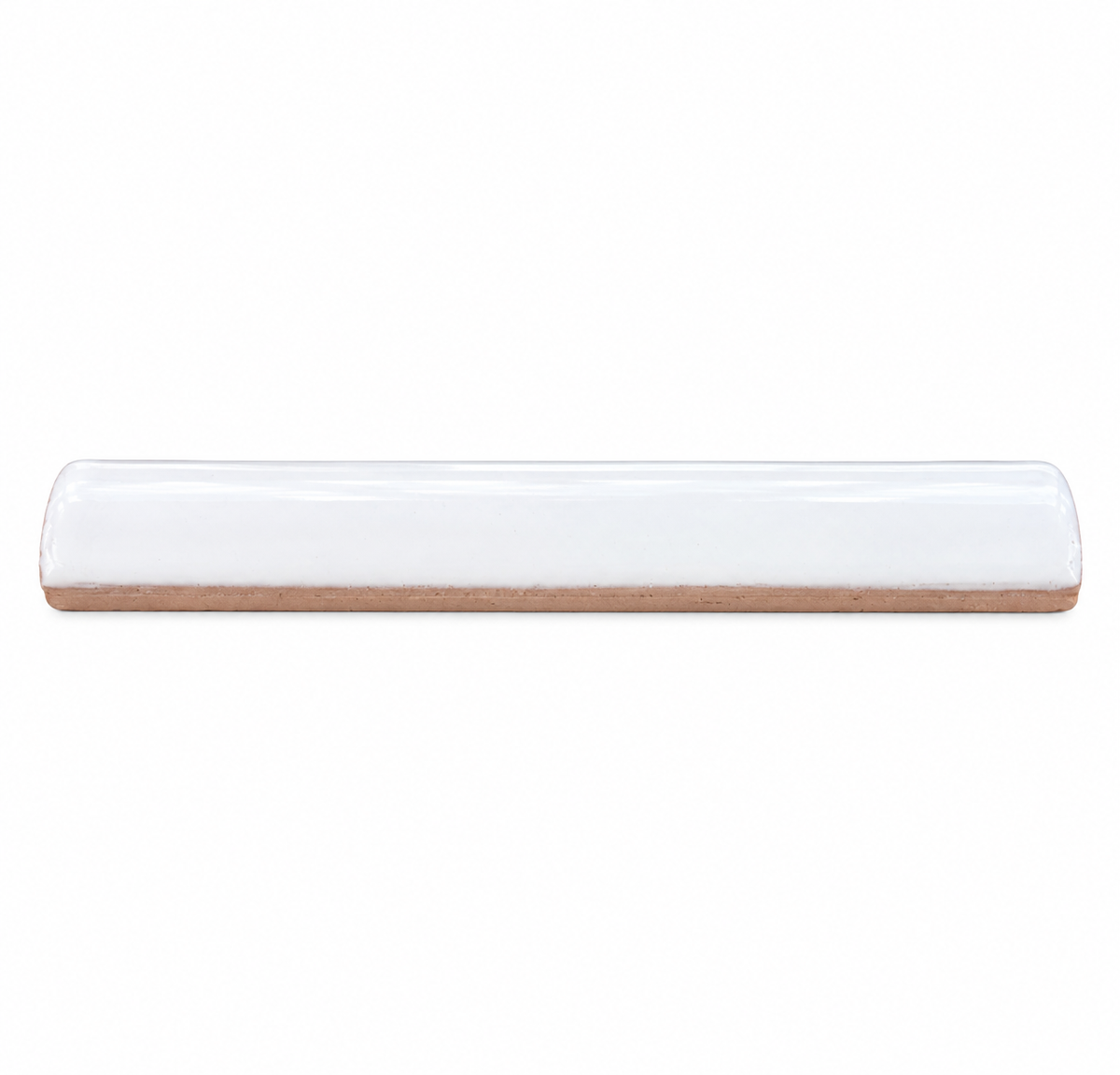 A single white glazed ceramic pencil tile sits horizontally against a plain white background.