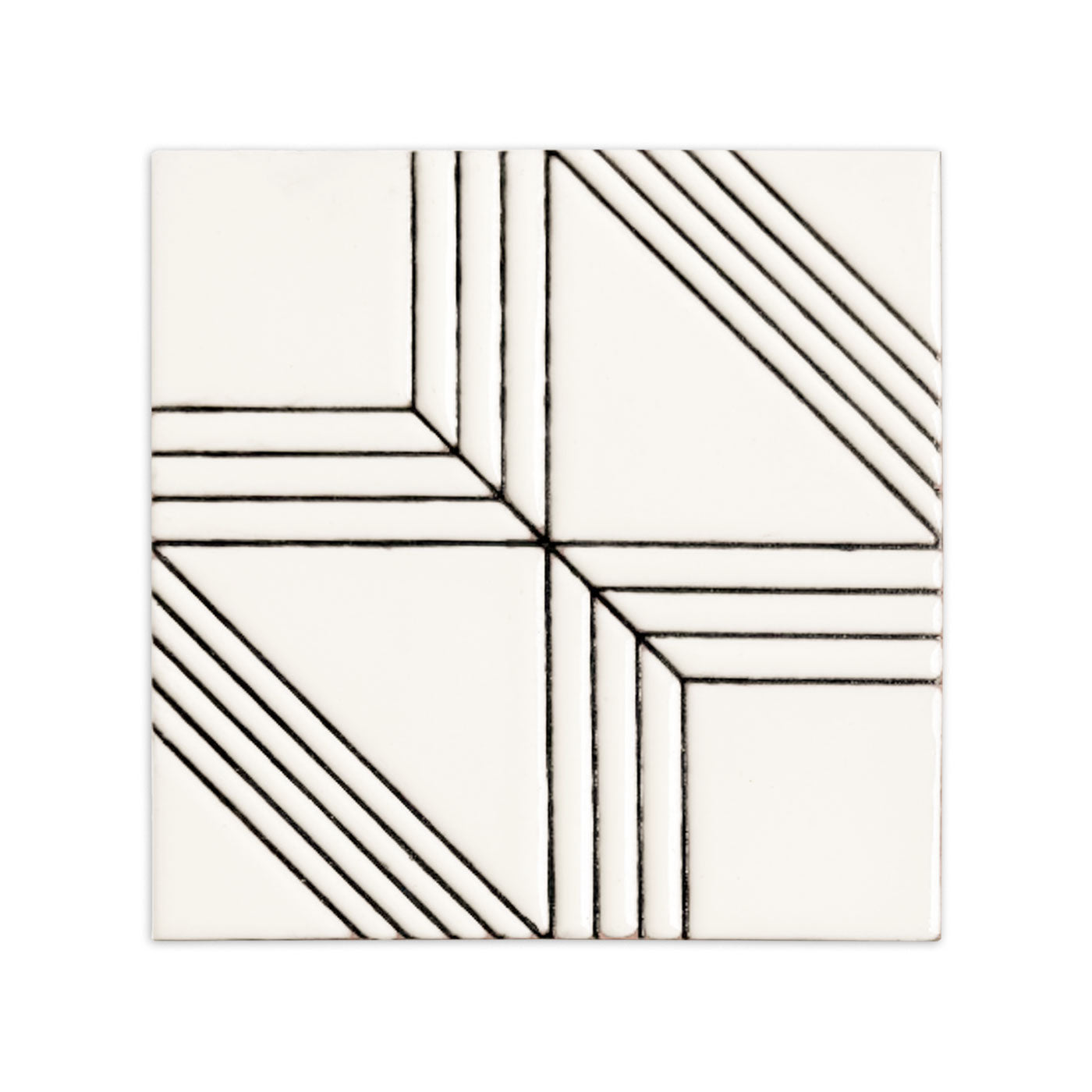 White relief tile by Clay Imports featuring black geometric lines creating a segmented pattern.