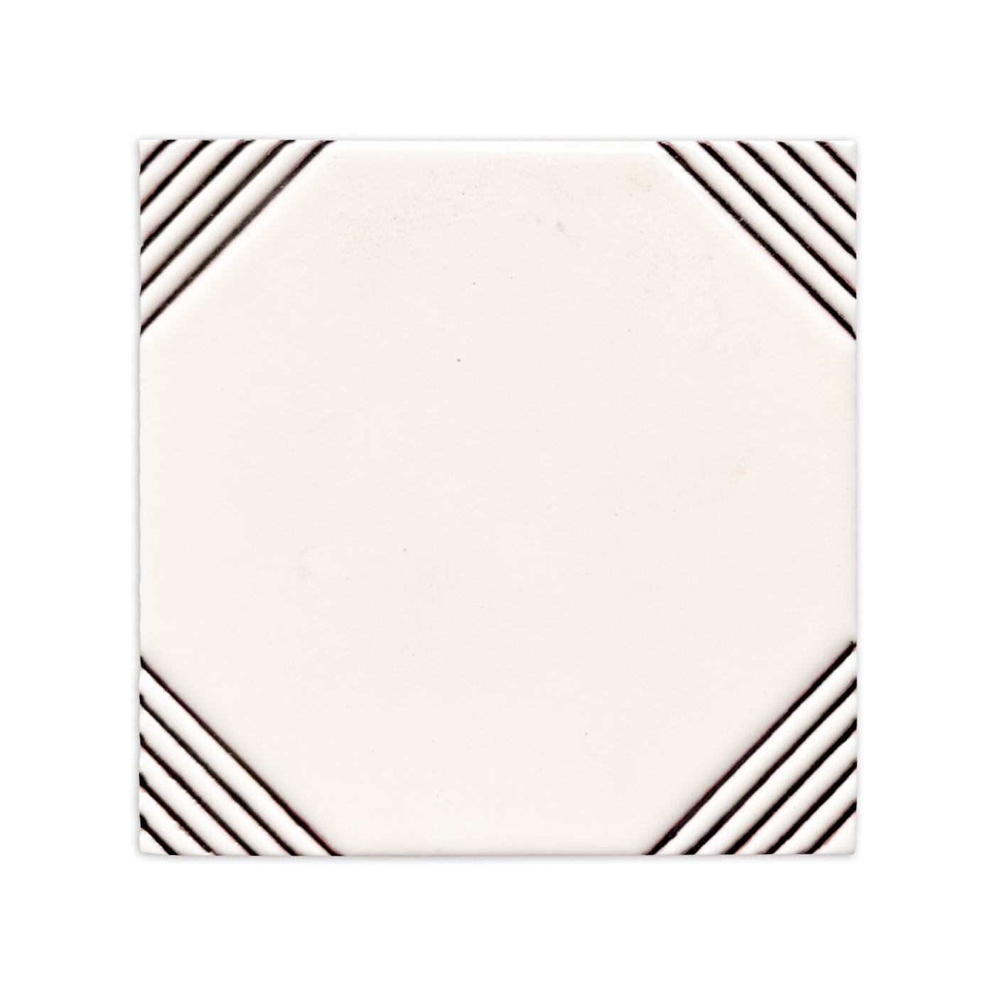 Off-white square relief tile by Clay Imports with black diagonal lines in all corners.