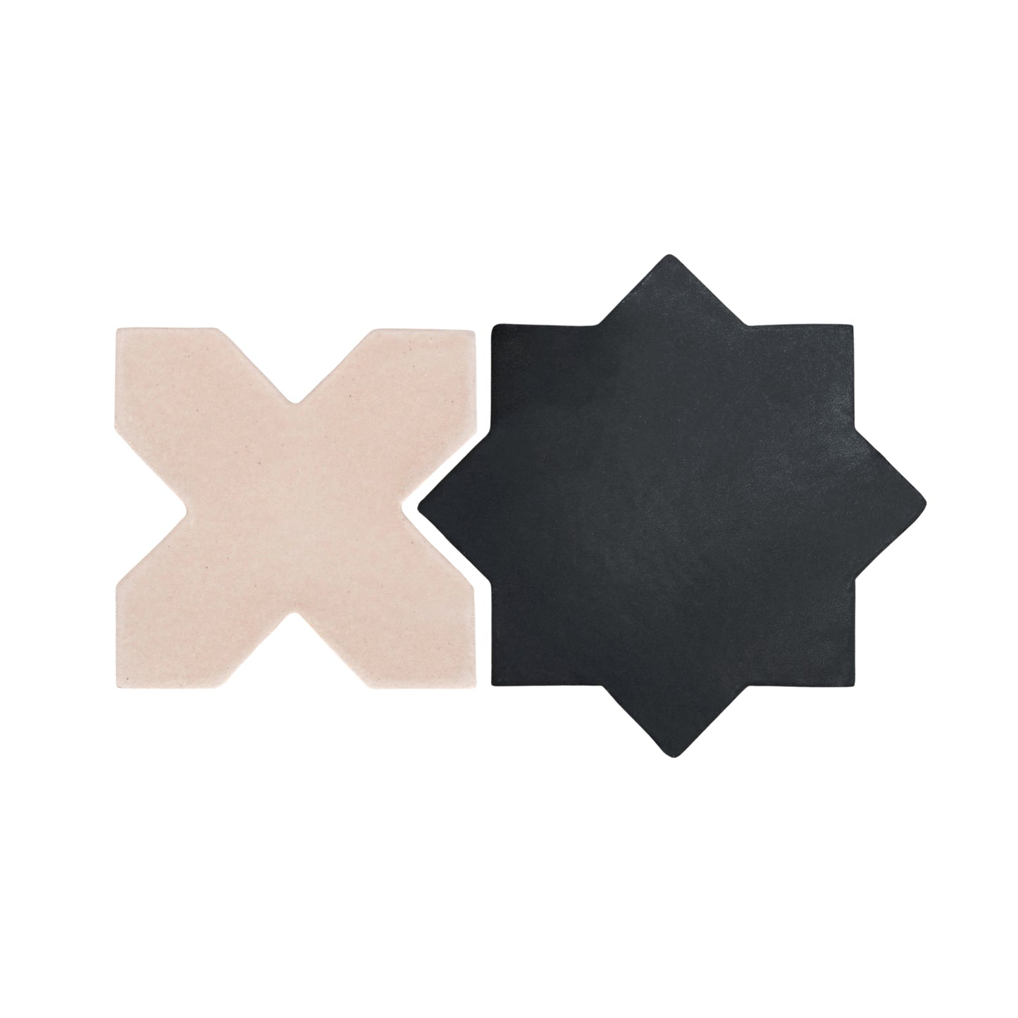 Two sample tiles, a matte black suede star and a light beige opaque cross, by Clay Imports, displayed side-by-side.