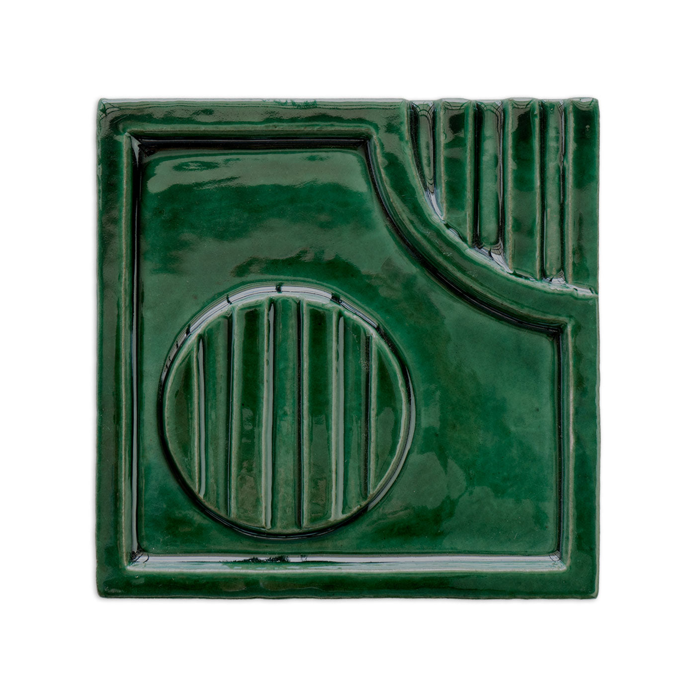 Green decorative tile by Clay Imports with a glossy finish and an abstract geometric raised pattern.