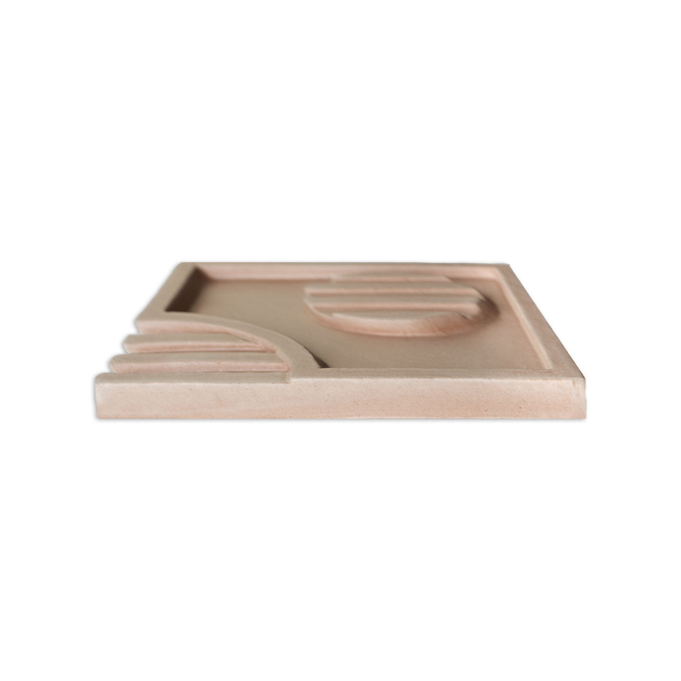 Light brown relief tile by Clay Imports, featuring abstract geometric patterns and a stepped design, viewed from the side.