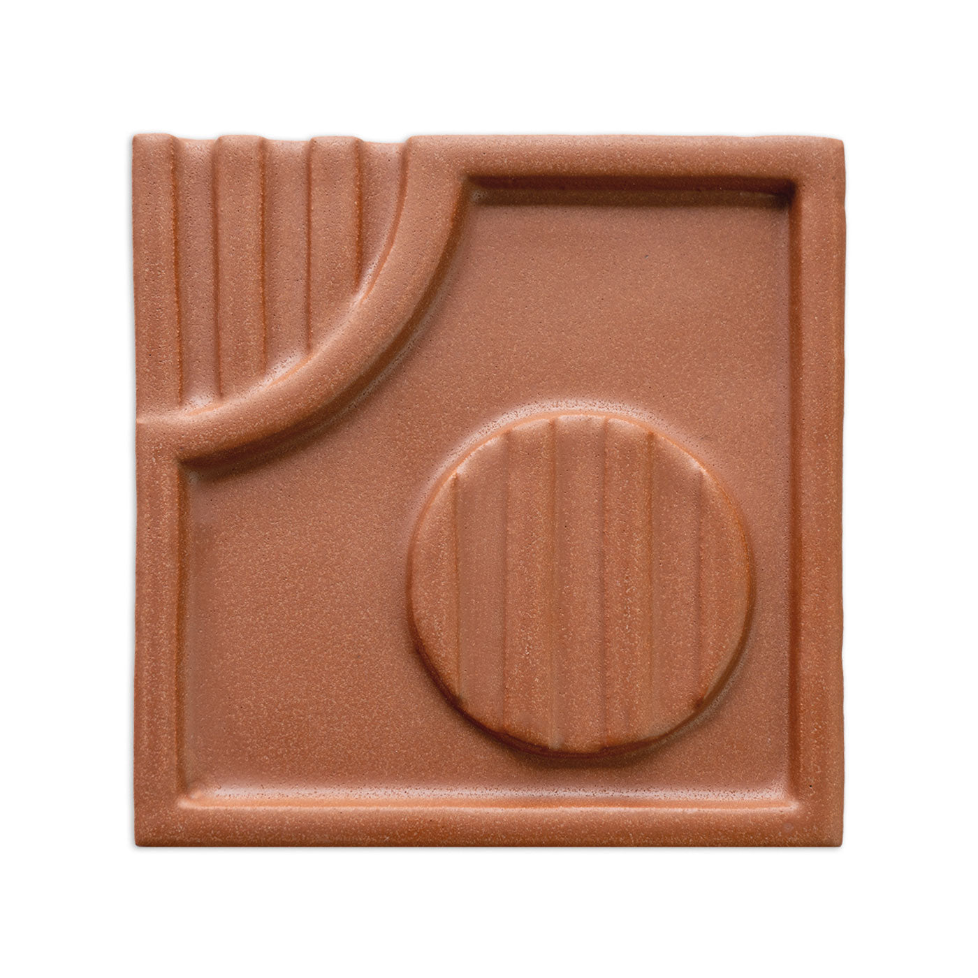 Mamey geometric decorative tile by Clay Imports, featuring raised quarter-circle and circular patterns with vertical grooves.