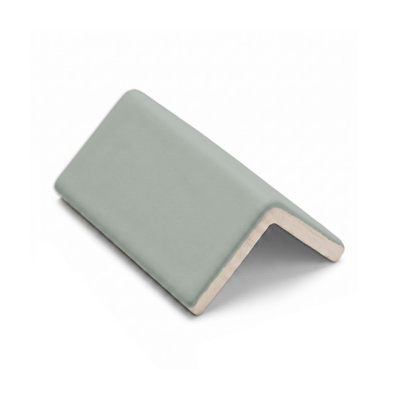Agave Solid Tile Trim by Clay Imports, a light green textured V-cap block.
