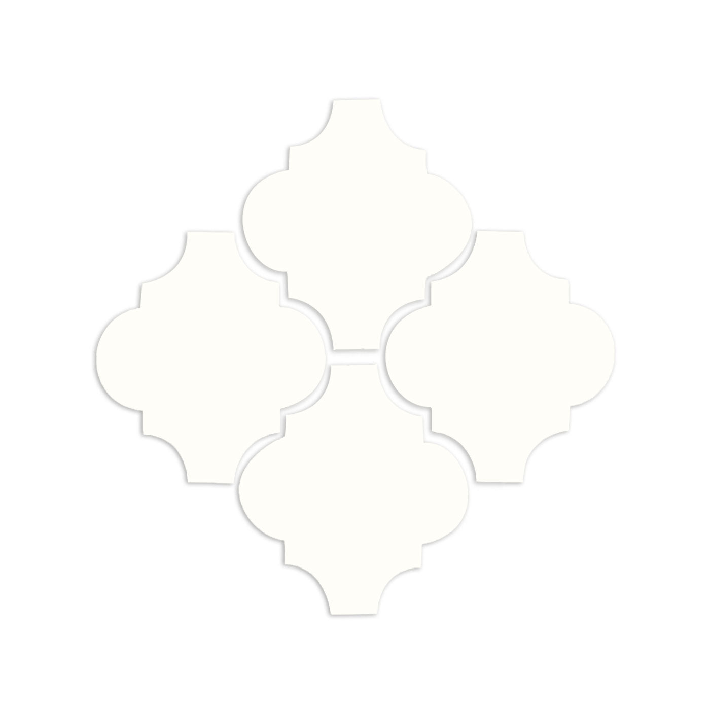 Chalk white Espanola sample tile by Clay Imports, four arabesque-shaped pieces arranged in a diamond pattern, casting subtle shadows.