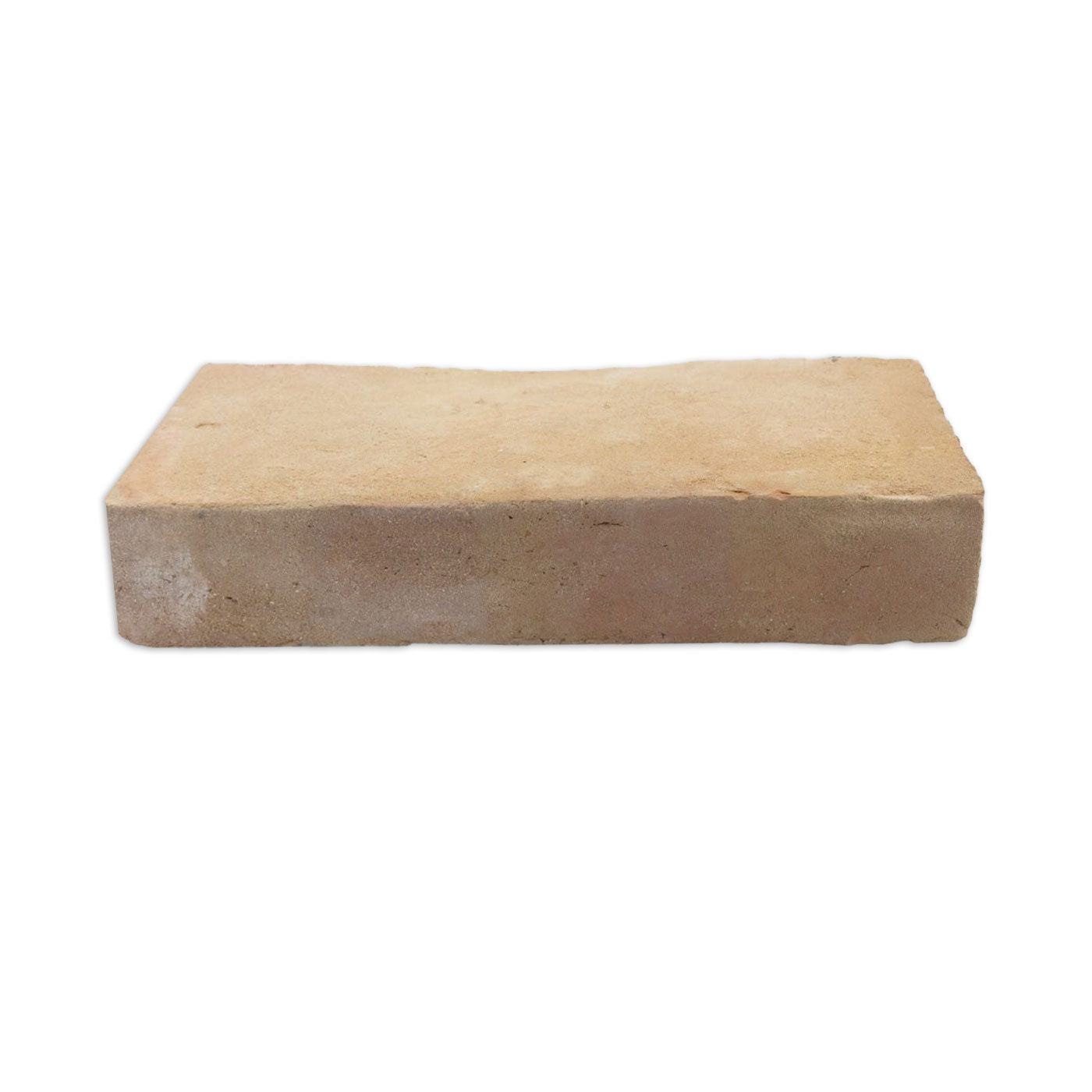 Terracotta brick paver by Clay Imports Pavers, light sandy color with a rough texture, viewed from the side.