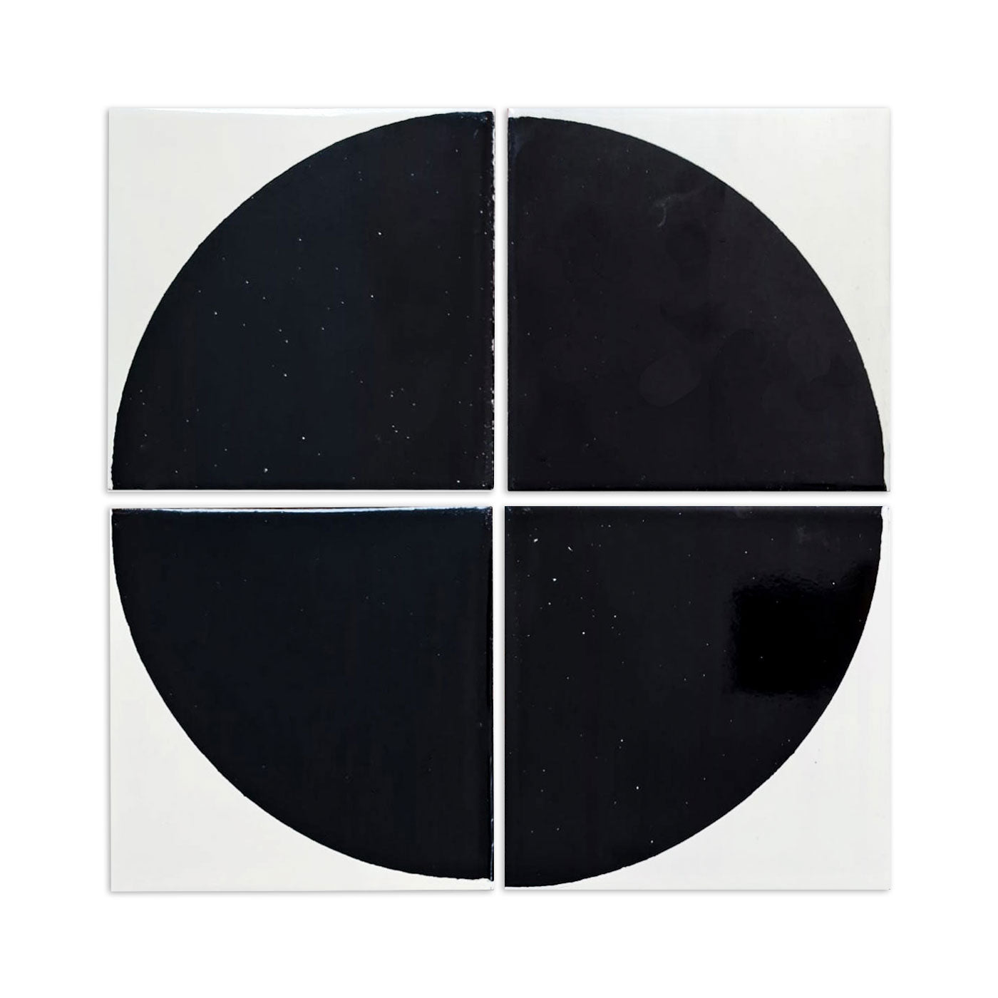 Deep black and white pool waterline tile by Clay Imports, arranged as four quarter-circle pieces forming a full circle.