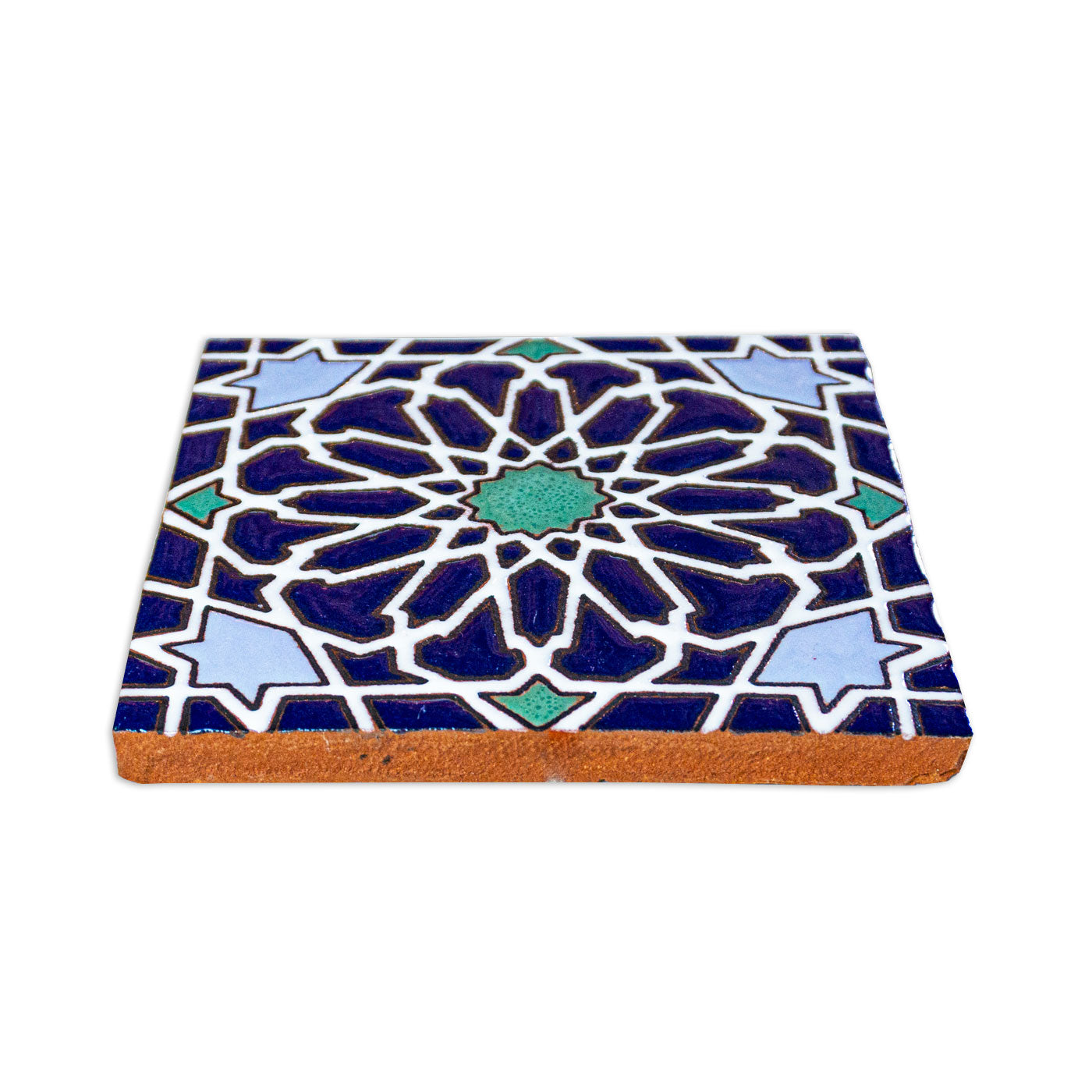 A pattern tile with a deep blue, light blue, and teal geometric design, outlined in white, and a light brown terracotta side, shown at an angle.
