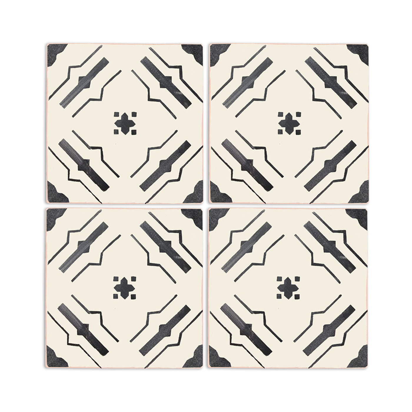 Anejo Nakbe sample tile by Clay Imports, featuring a black geometric star and border pattern on off-white.