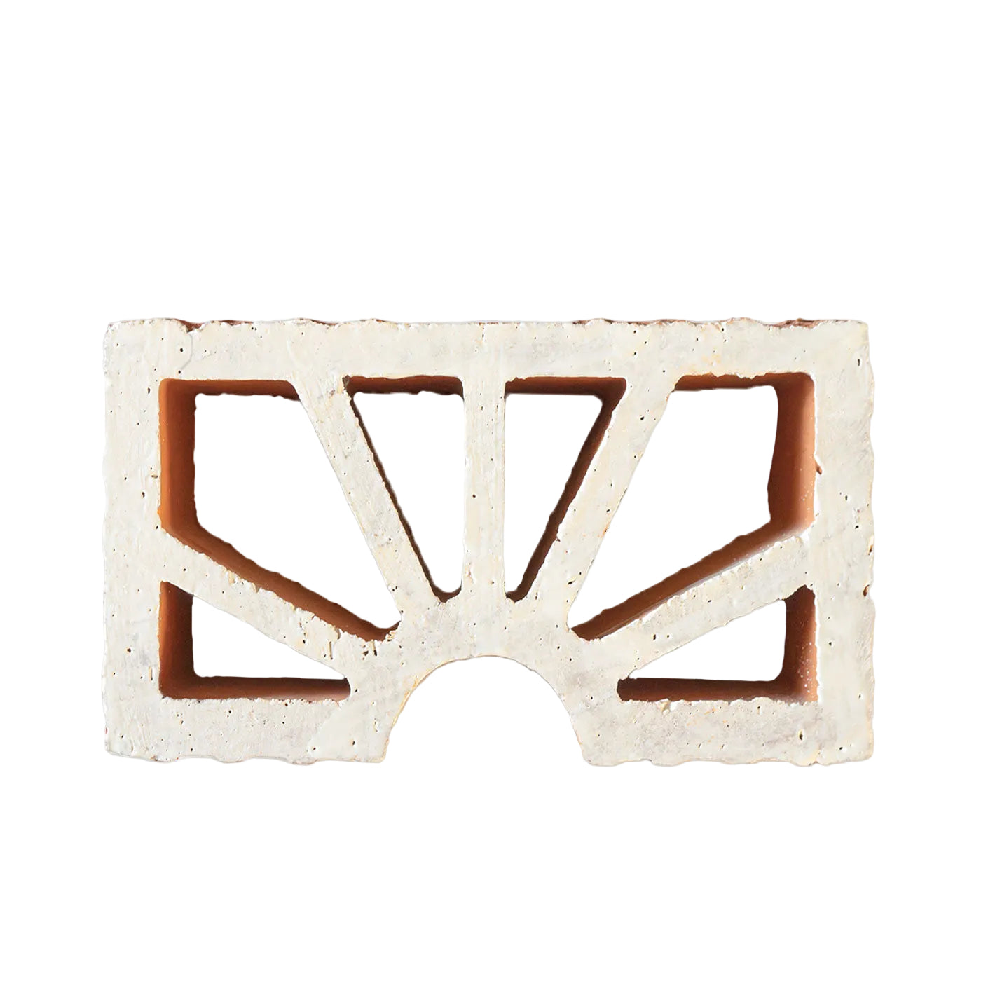 White glazed Petalo Tupelo breeze block by Clay Imports Breeze Blocks, featuring a sunburst cutout pattern.