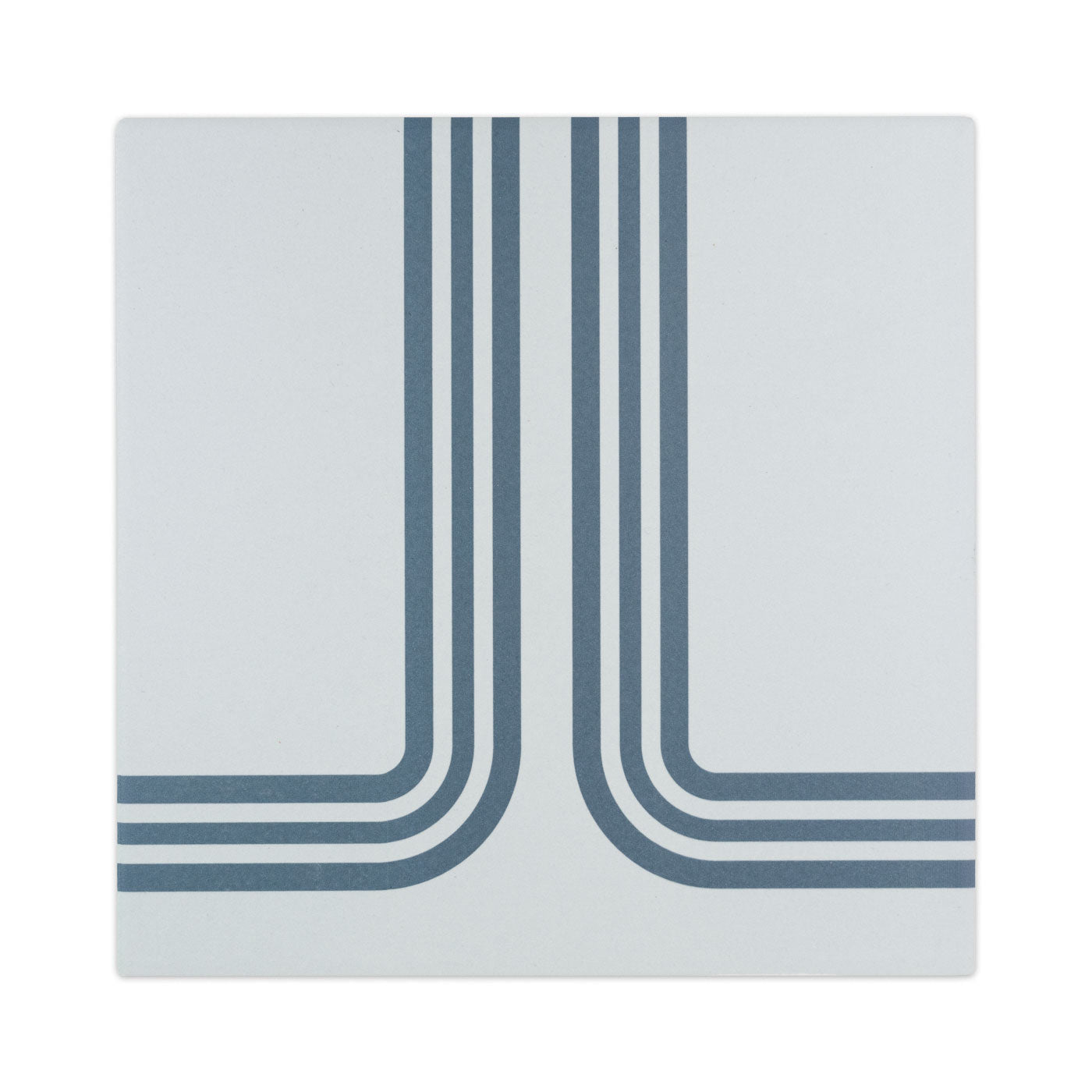 Light gray square tile by Clay Imports with a dark blue, retro triple-line geometric pattern.