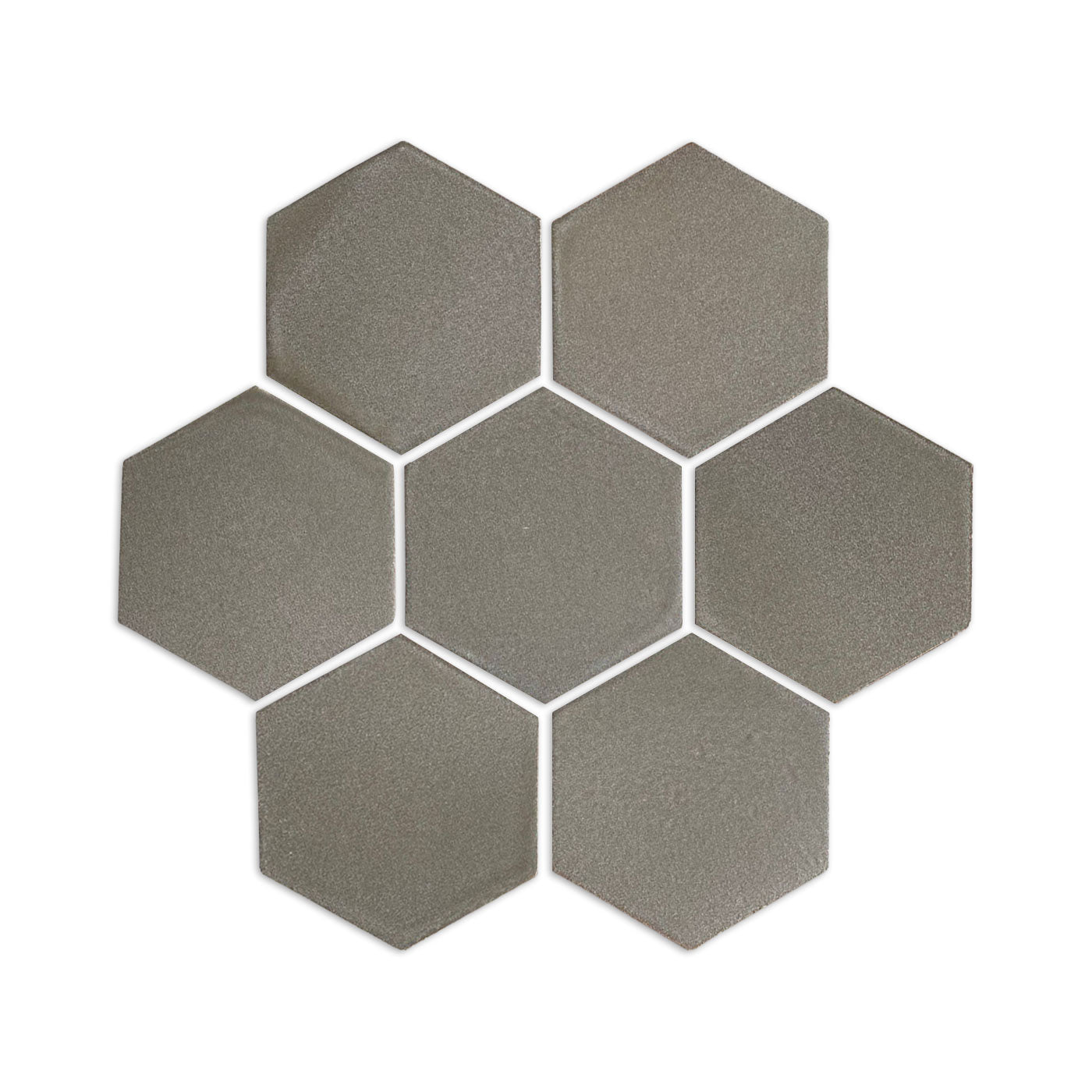 Taupe hexagon tile sample by Clay Imports with a matte, textured finish, showing seven tiles clustered together.