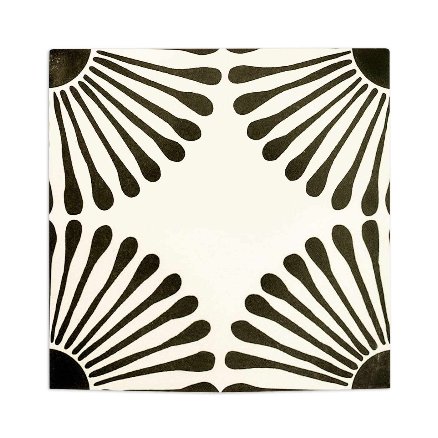 Black and off-white decorative tile by Clay Imports featuring a repeating sunburst pattern in each corner.