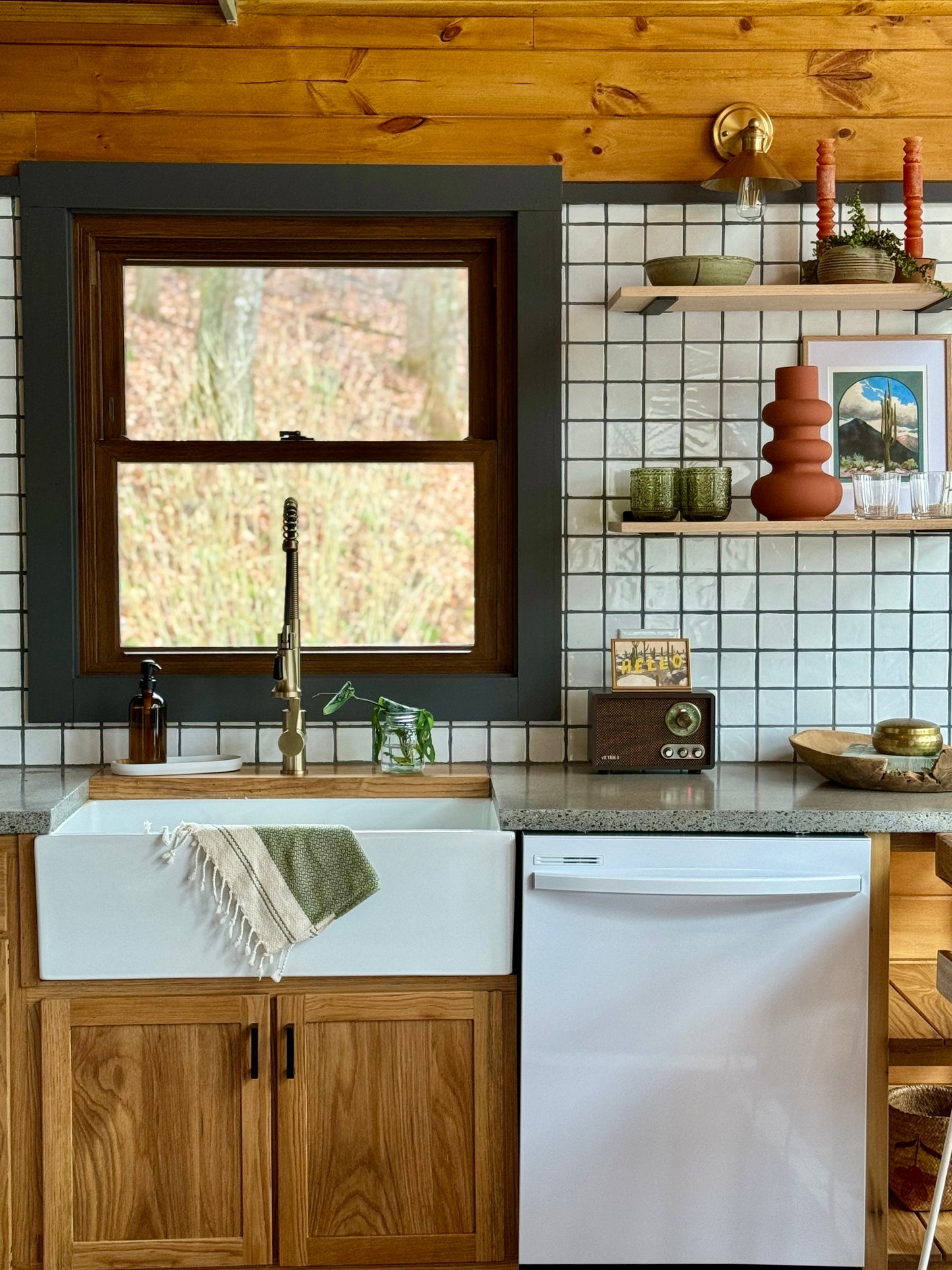 Milky White 3x3 tiles bundle by Clay Imports, featuring dark gray grout as a kitchen backsplash.