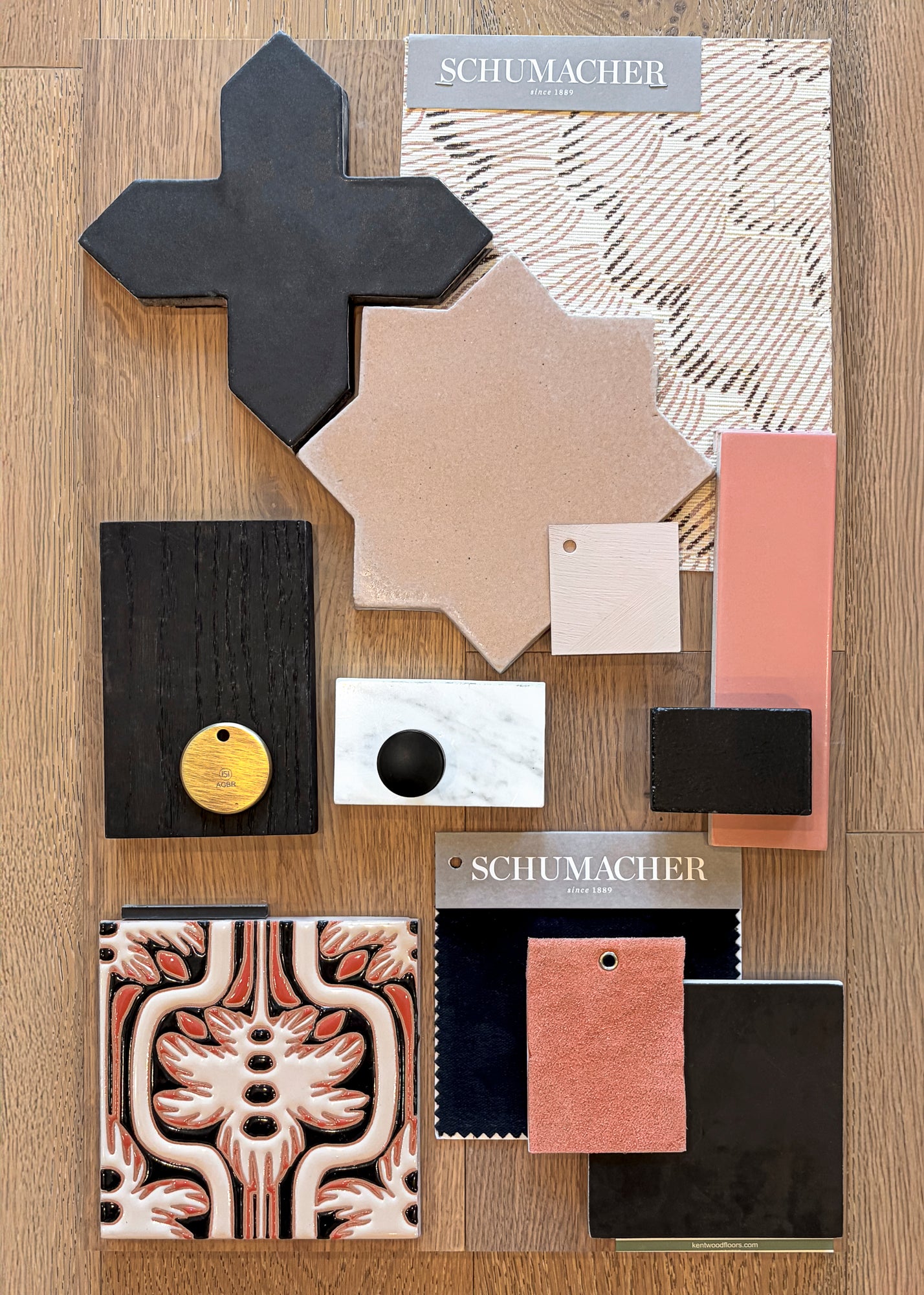 Etch design tile samples by Clay Imports, featuring black cross and star shapes, a decorative patterned tile, and complementary material swatches.