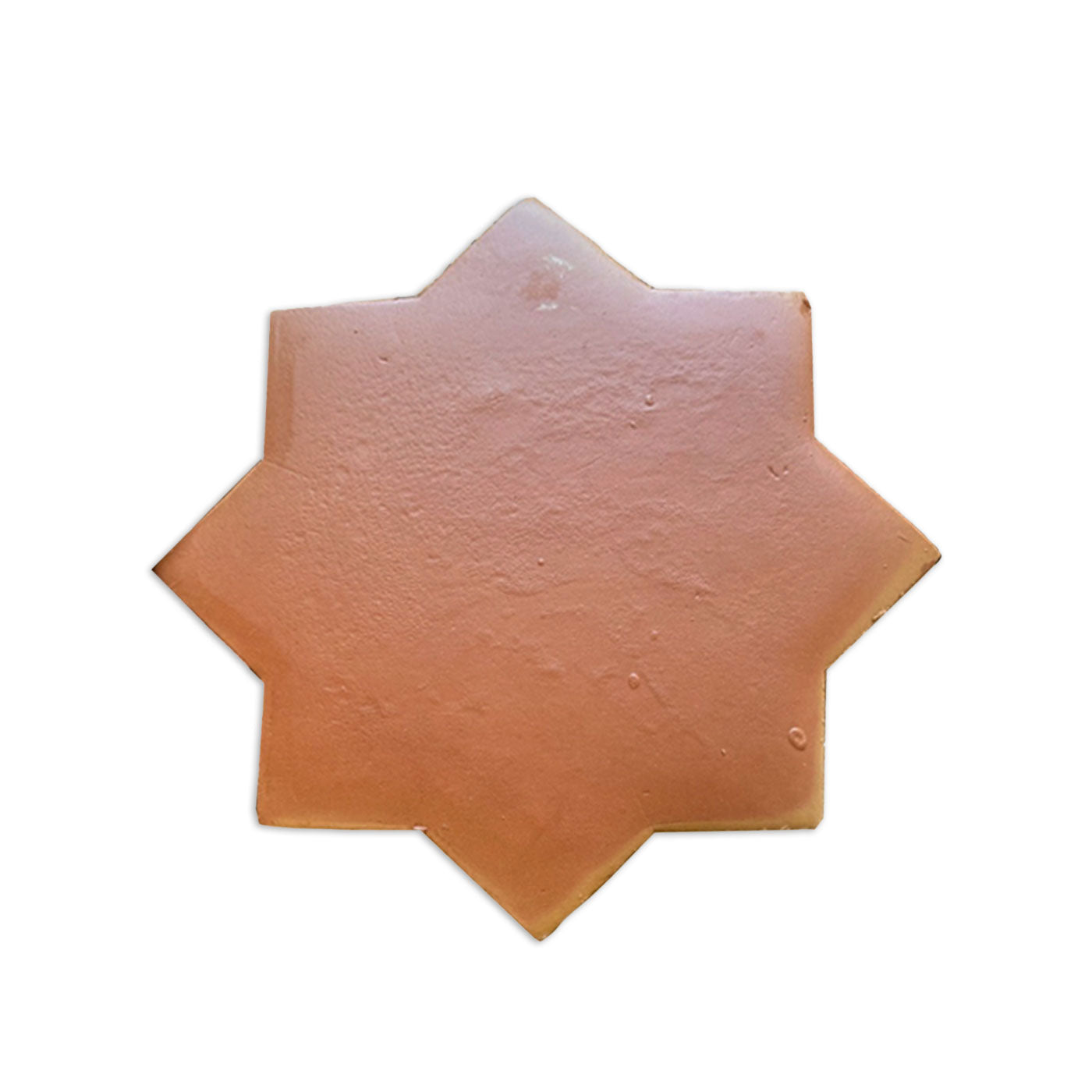Reddish-brown star-shaped tile sample by Clay Imports with a smooth satin finish, featuring an 8-point design and subtle surface texture.