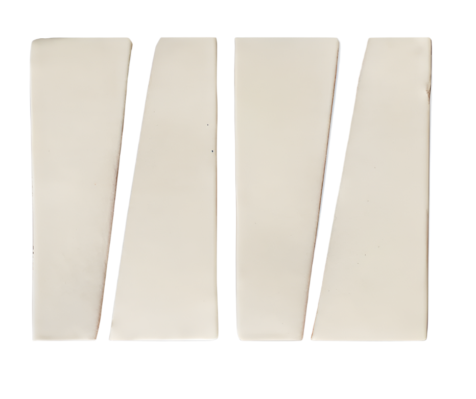 Cream Trumpet Candela 2x6 tile sample by Clay Imports, showing four pieces with angled cuts.