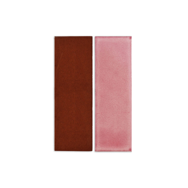 Two rectangular tile samples, one terracotta brown and one rose pink, by Clay Imports, displayed side-by-side.