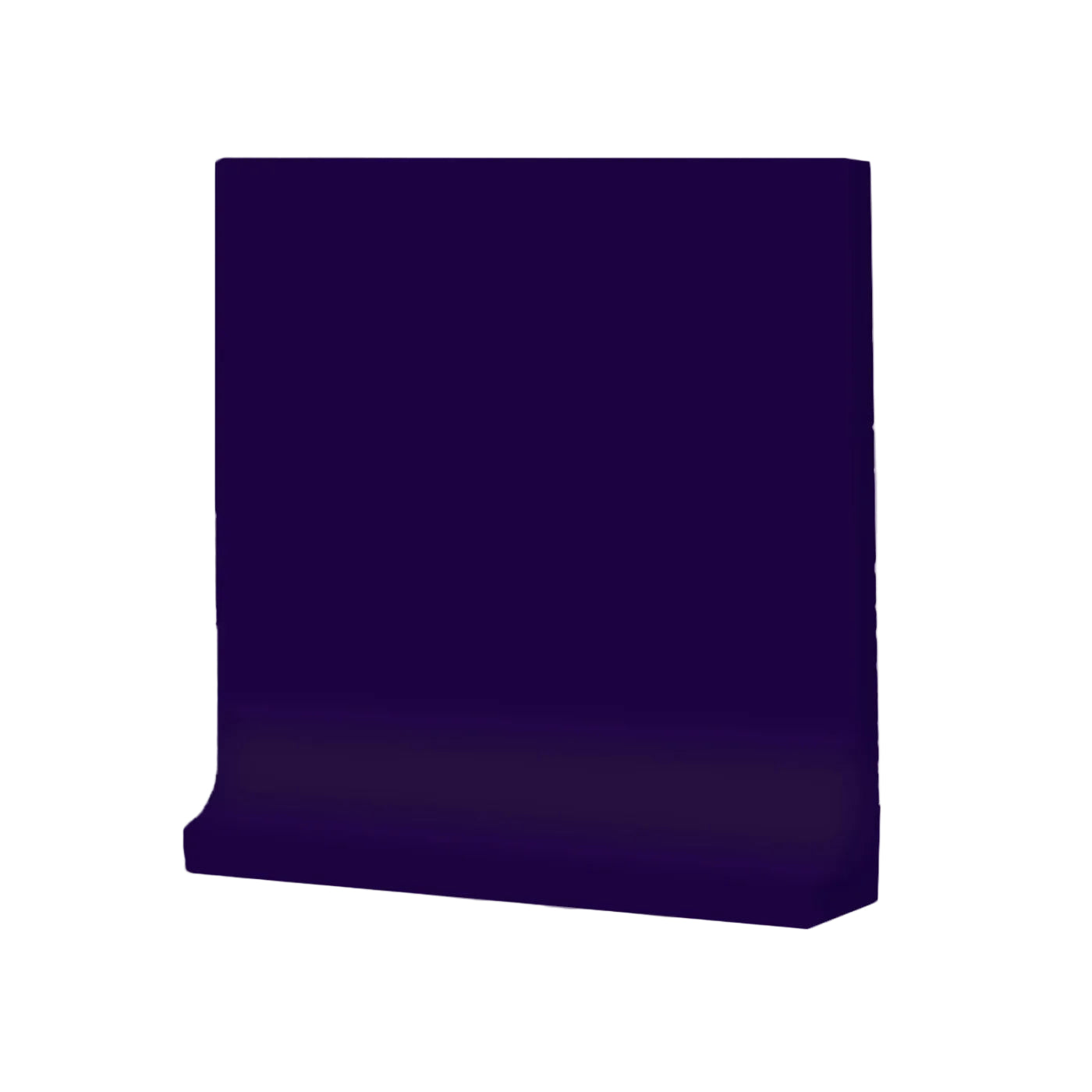 Flexible cobalt blue cove base tile trim by Clay Imports, partially unrolled with a smooth surface.