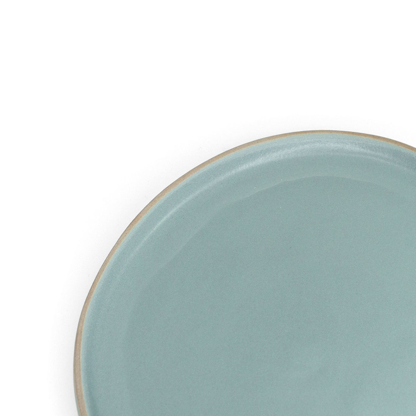 Teal dinner plate by Clay Imports with a natural stoneware rim and a matte texture, cropped on a white background.