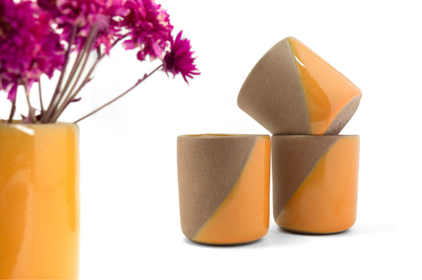 Ceramic cups with yellow glaze clay imports bricia lopez
