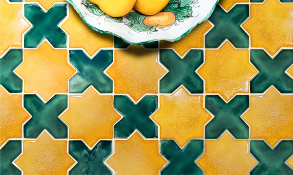 Yellow and green cross and star tile from kim wolfe paseo series clay imports