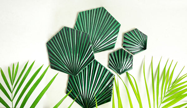 Green tile in the shape of palm leaves by clay imports tile