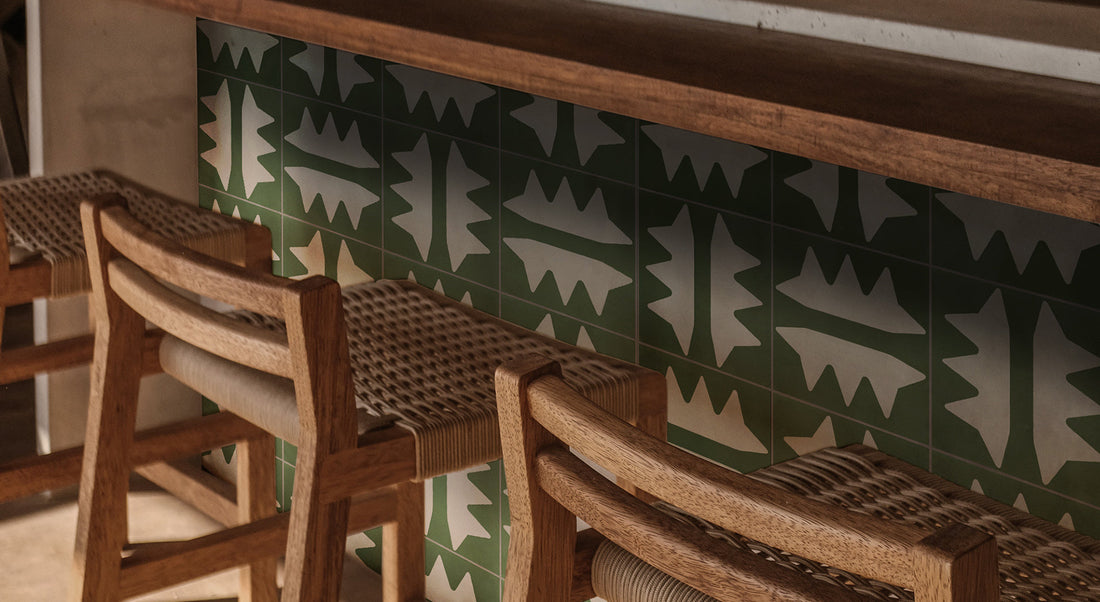 A stylish interior featuring Rohin Bhalla's distinctive Oaxaca patterned tiles and warm terracotta pottery.