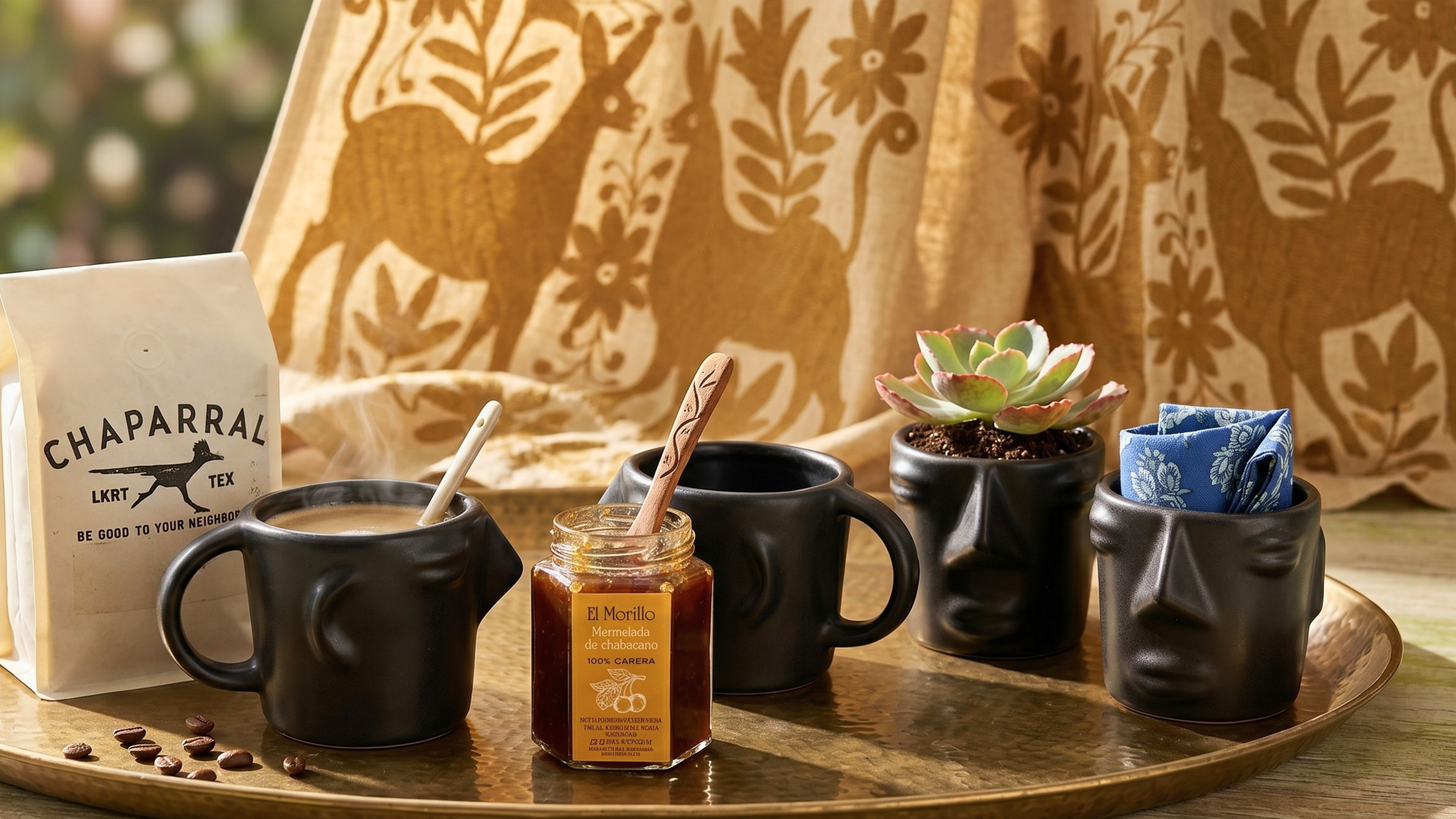 Handcrafted blue and terracotta stoneware, coffee, and incense create a serene, earthy atmosphere for slow living.