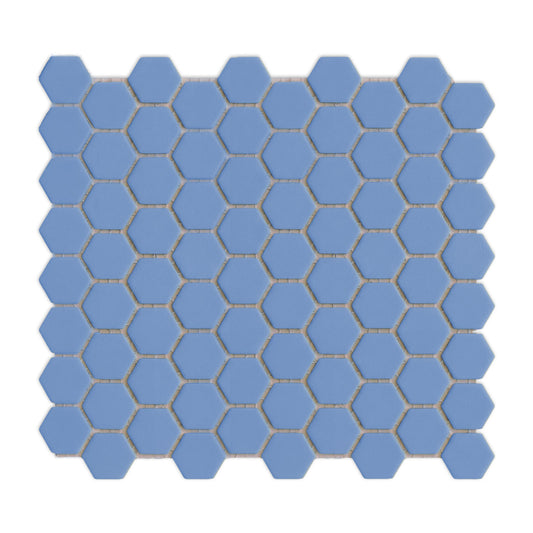 Denim blue hexagon clay tiles by Clay Imports, laid out in a meshed pattern with white grout.