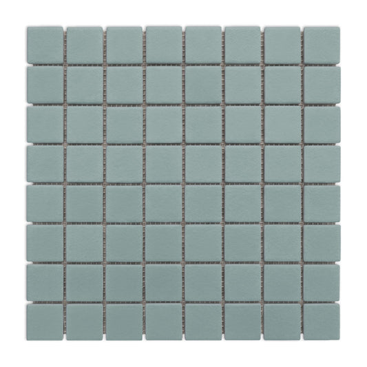 Muted green square clay tiles by Clay Imports in a meshed grid pattern with light grout lines.