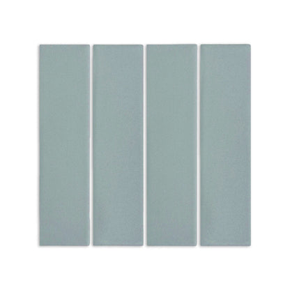 Four light blue-green rectangular clay tiles by Clay Imports, arranged vertically with thin white grout lines, featuring a matte, textured surface.