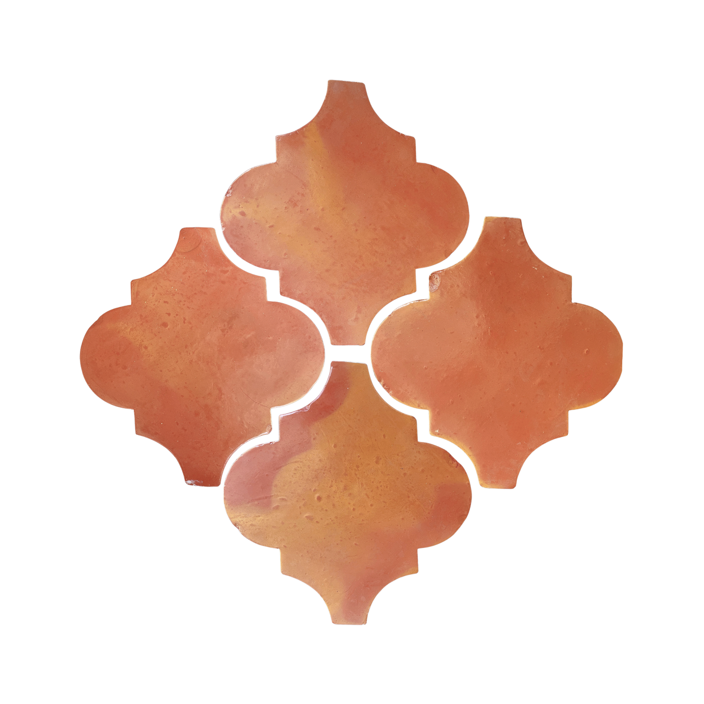 Four variegated orange smooth gloss Espanola terracotta tiles by Clay Imports, arranged in a decorative quatrefoil layout.